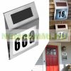 Solar lamp illuminating house number in small size. Outdoor design, flat shape, stainless steel, 2 LED lights. Waterproof and bird-proof design