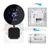 Smart thermostat for a gas boiler. Round black smart thermostat that can be controlled remotely and can be timed